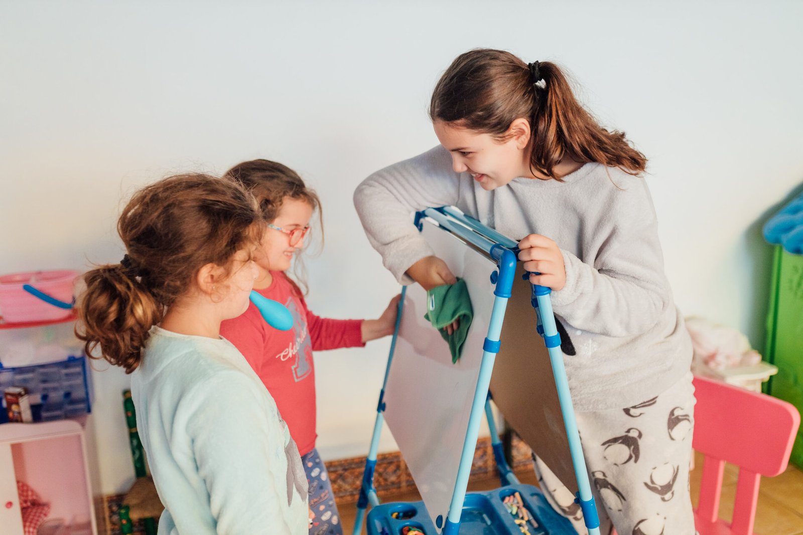 girls having fun with whiteboard at home 2026 03 17 14 40 12 utc scaled