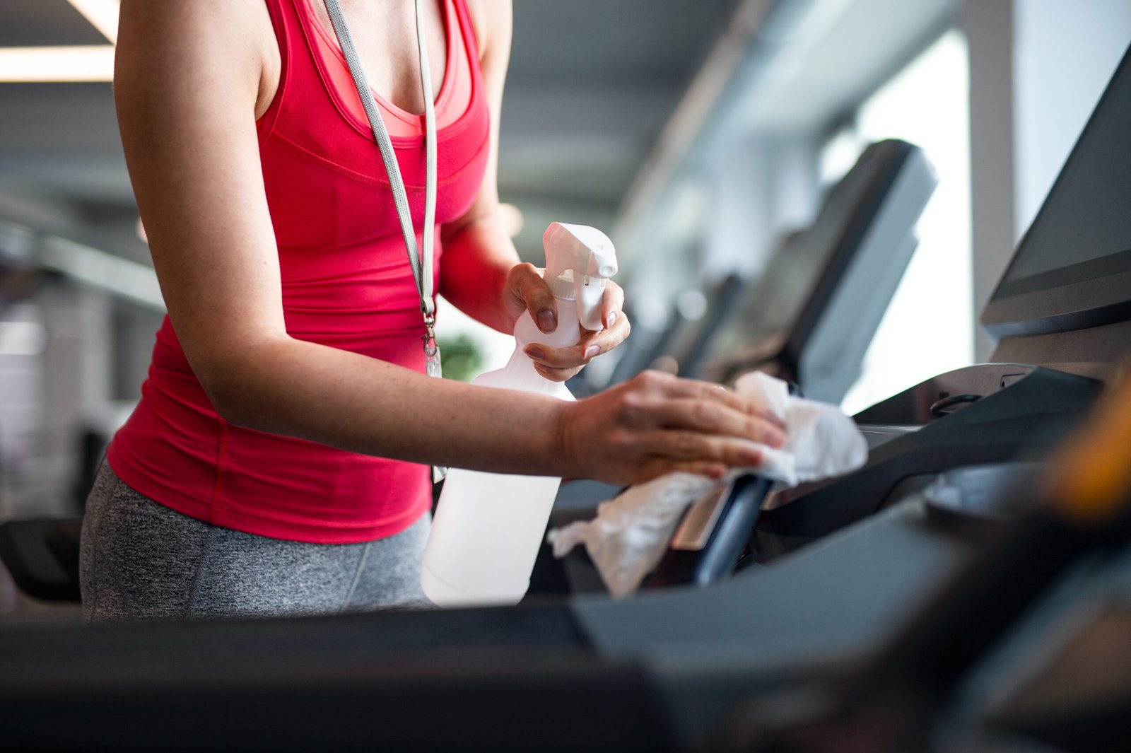 midsection of fitness instructor disinfecting equi 2026 03 10 02 06 18 utc scaled
